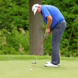 BENTON HARBOR, MICHIGAN - MAY 26: Colin Montgomerie of Scotland putts on the 10th hole during the first round of the Senior PGA Championship presented by KitchenAid at Harbor Shores Resort on May 26, 2022 in Benton Harbor, Michigan. (Photo by Stacy Revere/Getty Images)