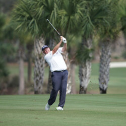 NAPLES, FLORIDA - FEBRUARY 18: Colin Montgomerie of Scotland hits an approach shot from the 8th fairway during the first round of the Chubb Classic at Tiburon Golf Club on February 18, 2022 in Naples, Florida. (Photo by Omar Rawlings/Getty Images)